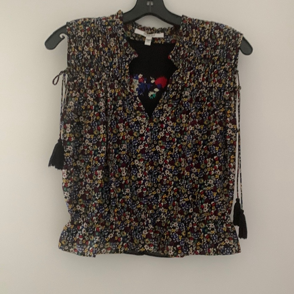 Adorable floral print top with tassels